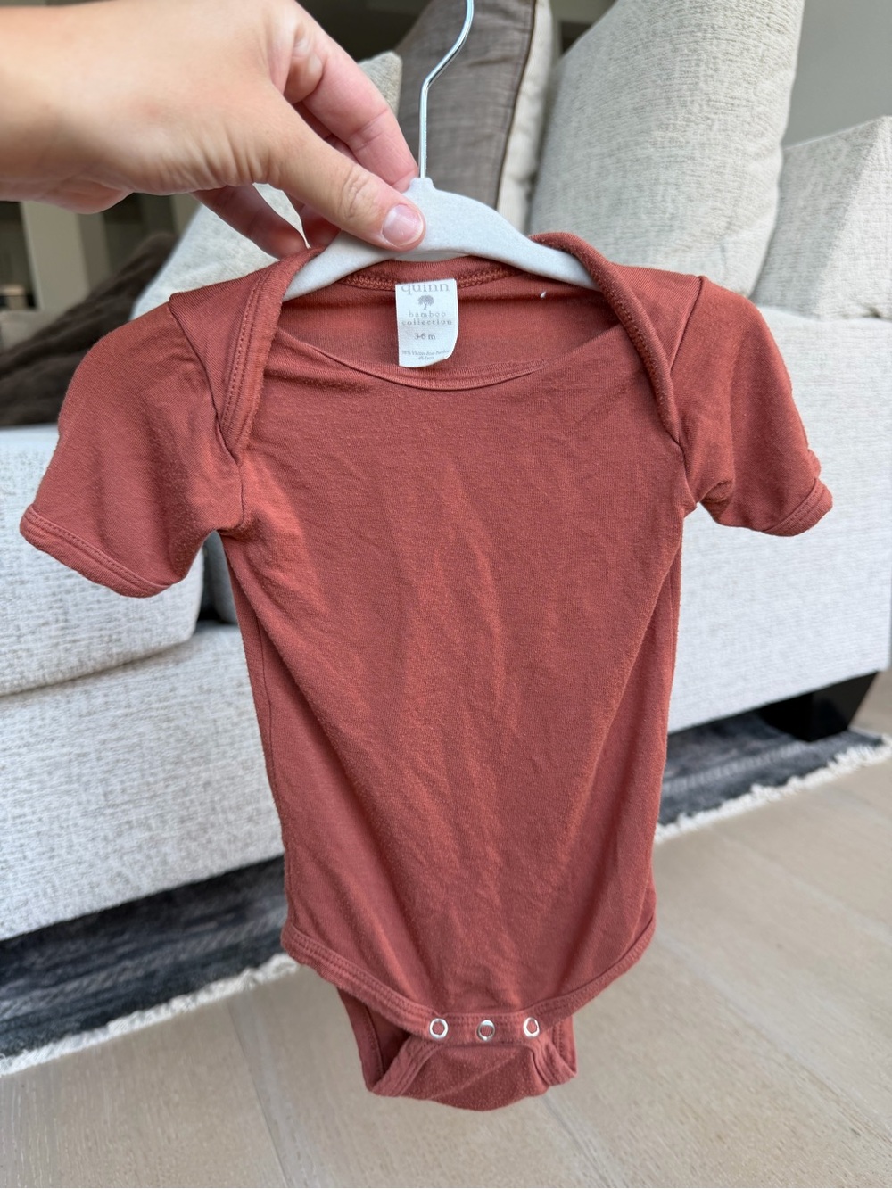 Kate Quinn Rust Short Sleeve Baby Bodysuit